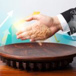 نمایی مفهومی از تحقیق و توسعه در ایران: ترکیبی از نمادهای هوش مصنوعی (مدارهای الکترونیکی)، سرمایهگذاری (نماد پول)، همکاری صنعتی-دانشگاهی (چرخدندهها) و رشد علمی (مغز و نهال).